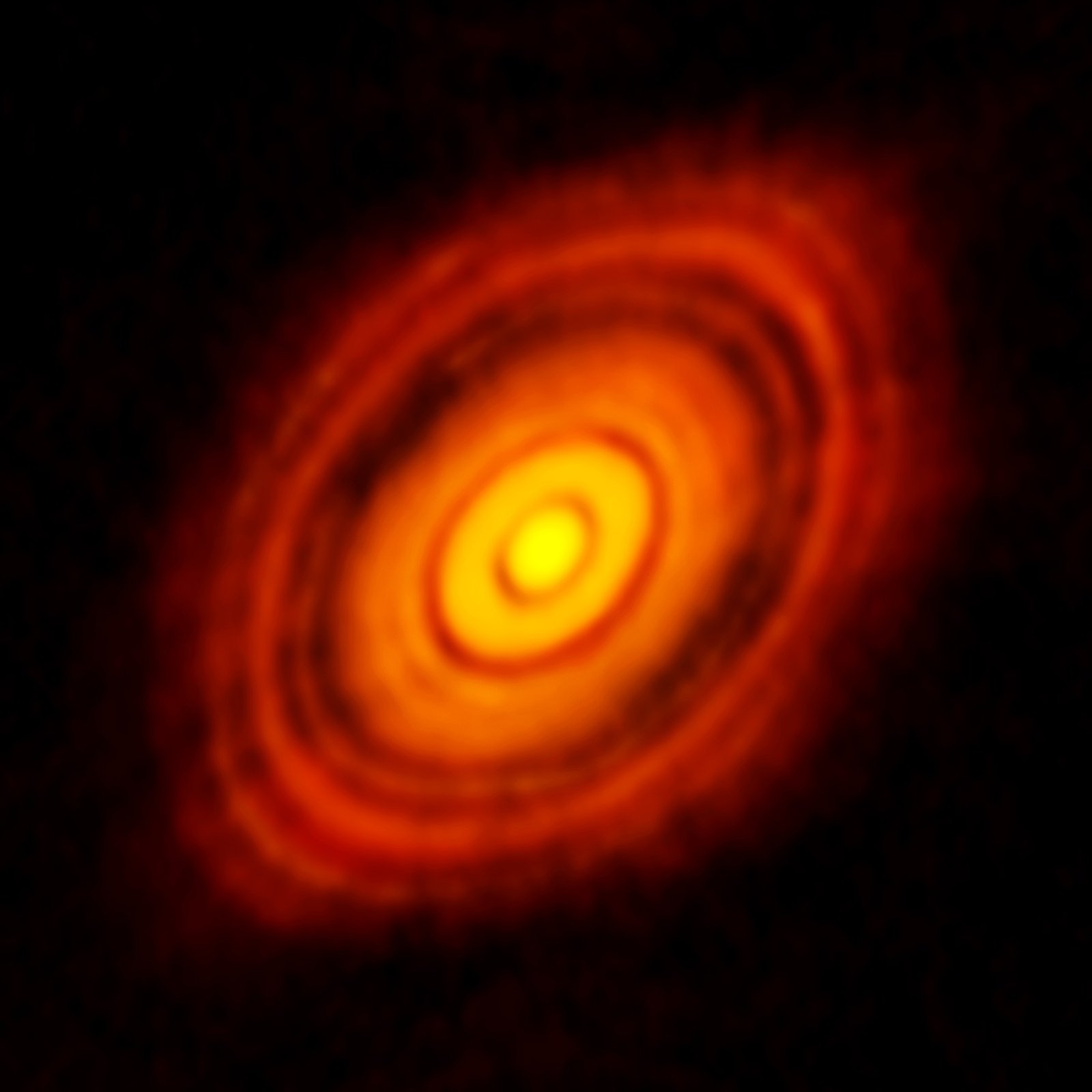 ALMA millimetre image of the protoplanetary disc around HL Tauri showing bright rings and dark gaps